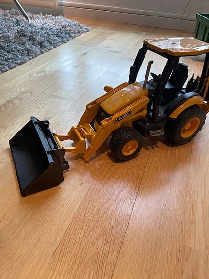 Bruder leksaksfordon traktorgrävare gul