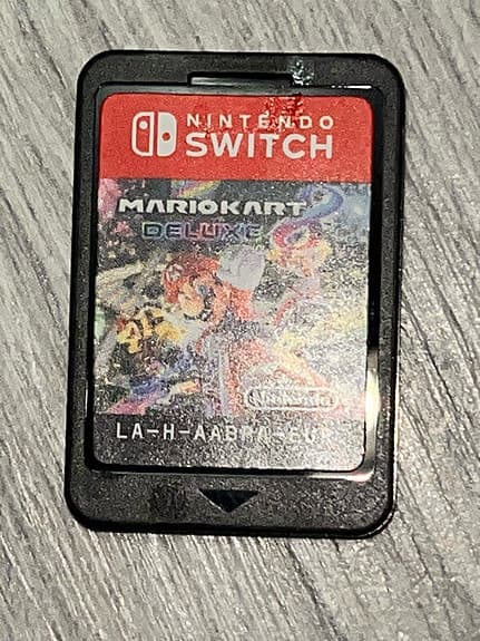 Nintendo Switch spelkonsol neon röd blå med spel och fodral