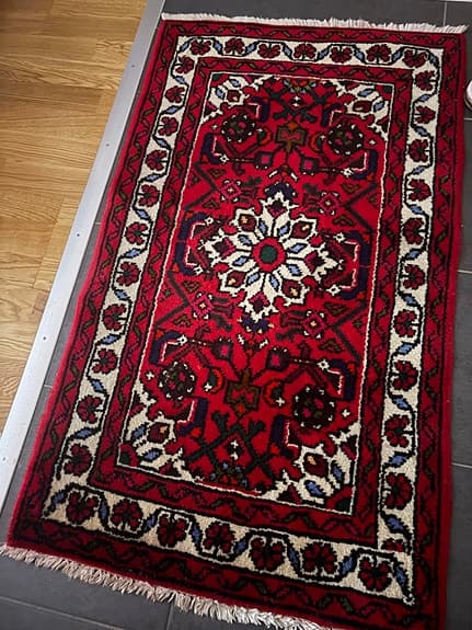 Äkta handknuten persisk matta 107x62 cm röd ull bomullsvarp