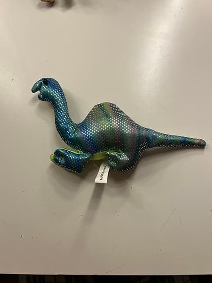 Mjuka dinosaurieleksaker och ödla