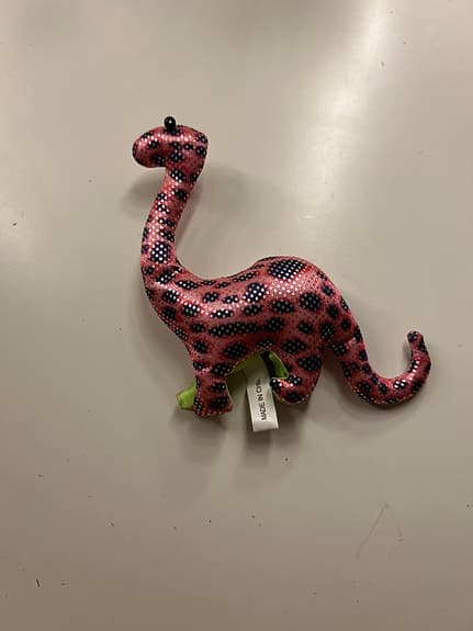 Mjuka dinosaurieleksaker och ödla
