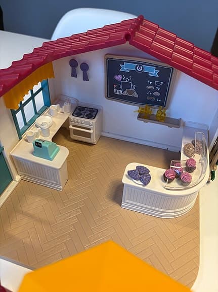 Schleich mm. leksaksset hästcafé med figur och häst