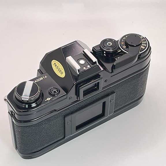 Svart Canon AE-1 kamerahus – Fullt fungerande