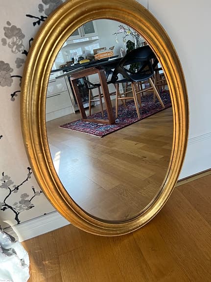 Oval guld spegel