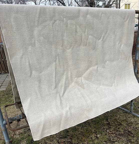 Handgjord ullmatta ”Care & Fair” beige