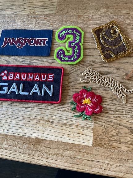 Jansport Bauhaus Galan tygmärken blandade motiv