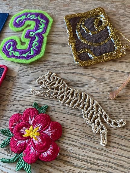 Jansport Bauhaus Galan tygmärken blandade motiv