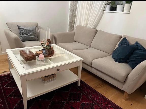 En 3-sits Tygsoffa och en fåtölj