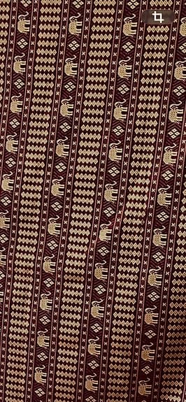 Pläd eller duk röd mönstrad med fransar