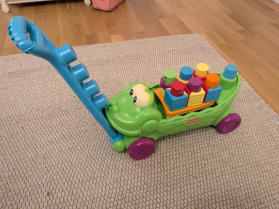 Fisher-Price leksakskrokodil med byggklossar