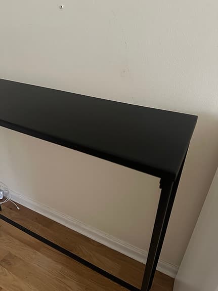 Avlastningsbord i svart metal