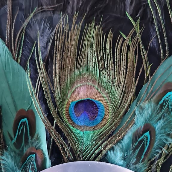 Fantastisk spegel med äkta Påfågelfjädrar. 45 cm. Handgjord!