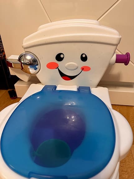 Fisher-Price  spelande potta