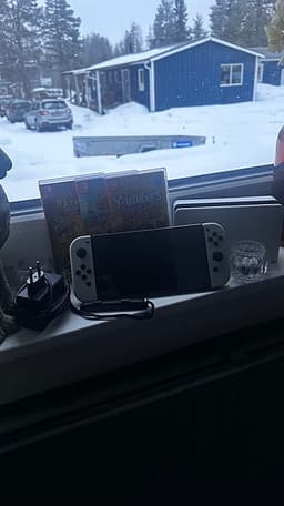 Nintendo Switch OLED + 3 spel – fint skick