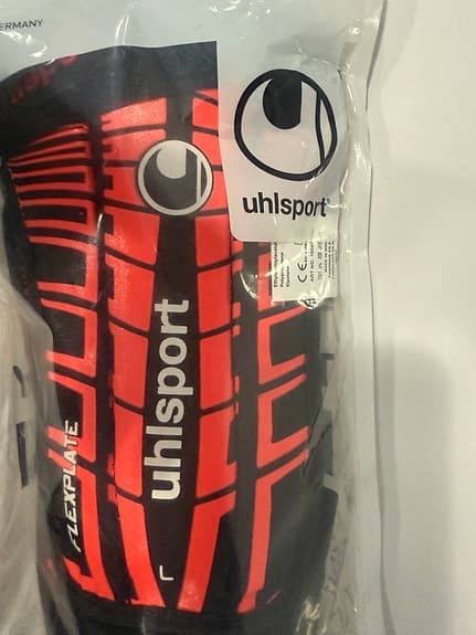 Uhlsport Flex Plate benskydd M svart/röd