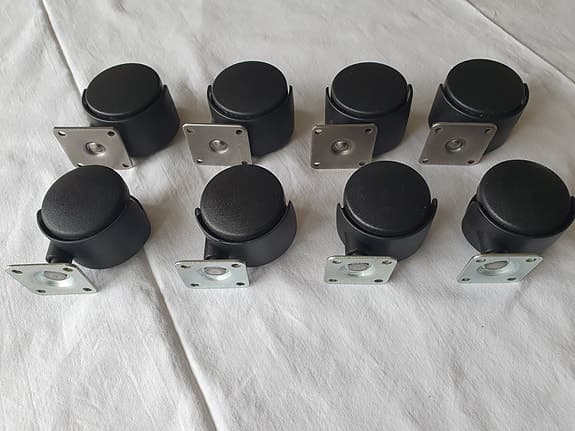 8 svarta möbelhjul med fästplatta av stål