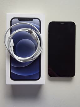 iPhone 12 med orginal kartong och laddkabel