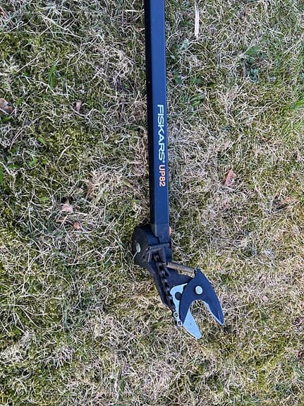 Fiskars teleskopisk grensax svart