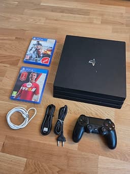 PS4 Pro 1TB + handkontroll + 2 spel (Battlefield 4 & FIFA 18)