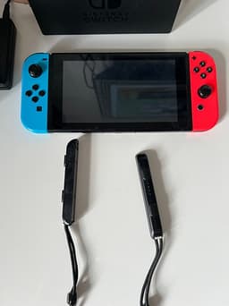 Nintendo Switch spelkonsol neon röd/blå