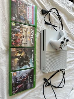 Xbox one s med handkontroll och spel