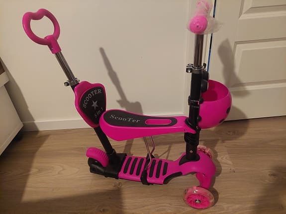 Rosa 5-i-1-sparkcykel med nyckelpiga för barn, sadel och körhandtag