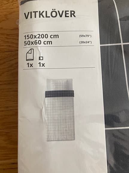 Oanvänd sängkläder Vitklöver