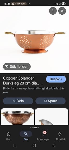 durkslag i kopparfärg och rostfritt