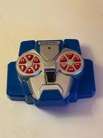 Fjärrstyrd robotleksak blå plast, Transformer.