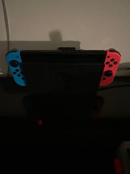 Nintendo Switch spelkonsol neon röd/blå med extra blå handkontroll