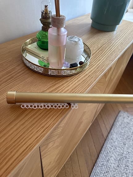 gardinstång guld