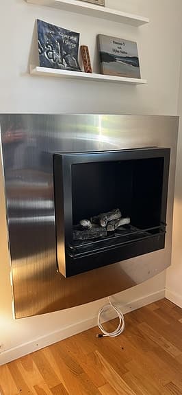 Väggmonterad kamin rostfritt stål svart
