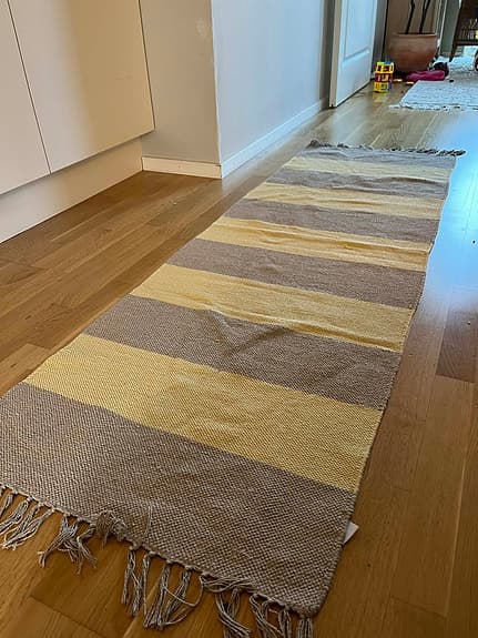 Åhléns Home matta randig gul/beige