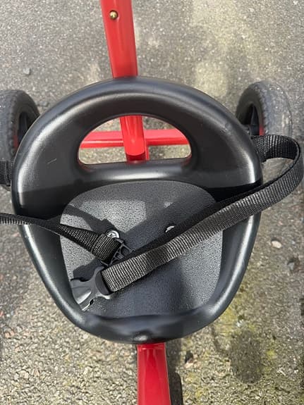 Trehjuling cykel med stång och korg