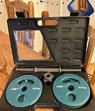 Andy hantelset viktskivor med stång och väska