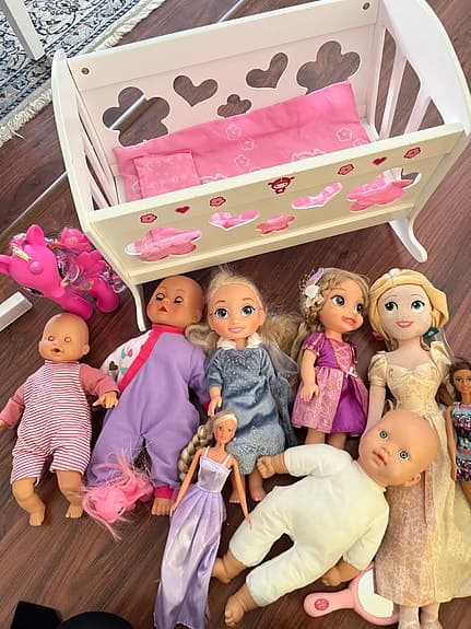 Disney dockor set med dockvagga