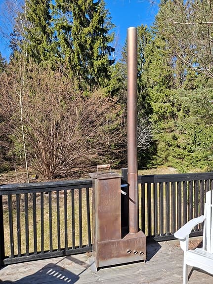 Badtunna, vedeldad kamin inkl pump.