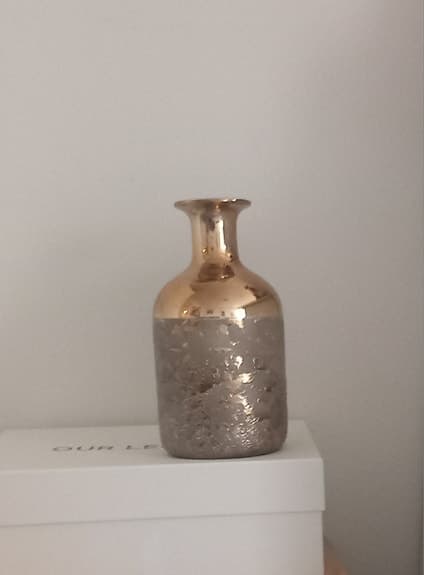 Golden coated ceramic vase