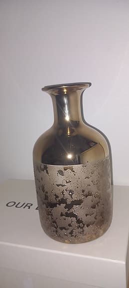 Golden coated ceramic vase