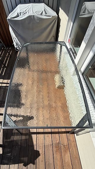 Matgrupp utebord glas med stålram och stolar svart