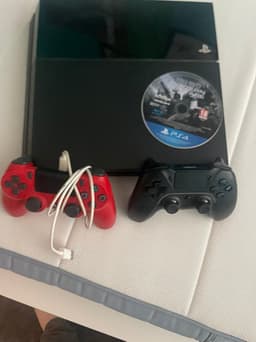 Sony Playstation 4 spelkonsol med två handkontroller svart röd