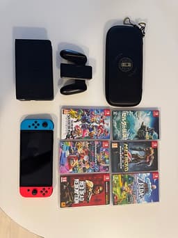 Nintendo Switch OLED med spel och fodral