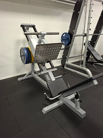 Benpress träningsmaskin fristående metall grå