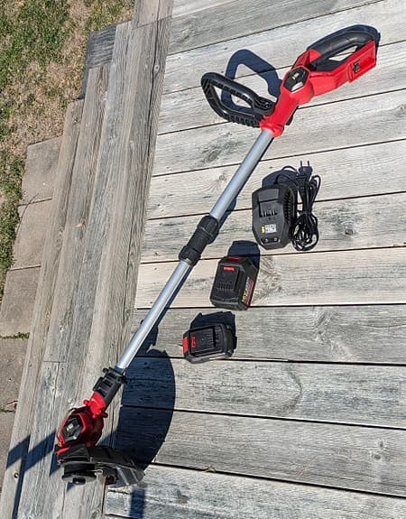 18V batteridriven grästrimmer med 2 batterier och laddare