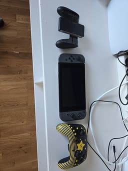 Nintendo Switch spelkonsol grå extra kontroll