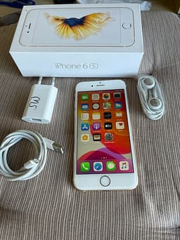 iphone 6s med kartongen och hörlurar
