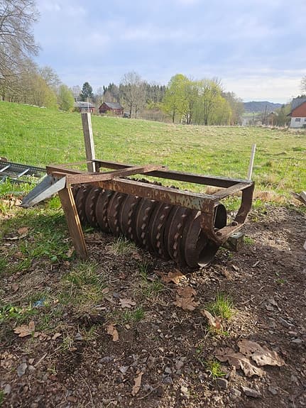 Ringvält för åkgräsklippare