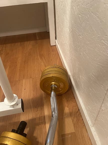 Klarfit träningsbänk med skivstång och vikter