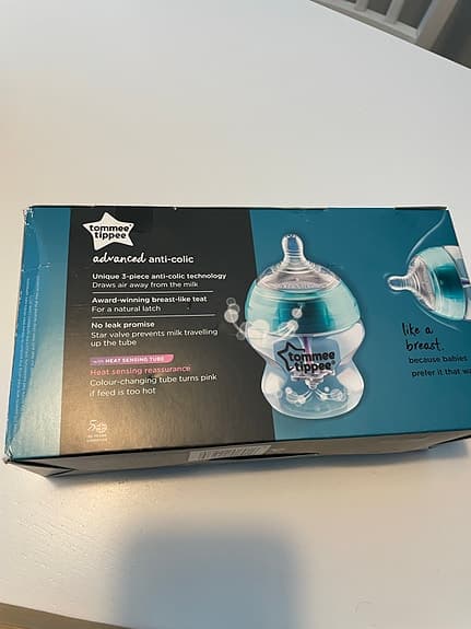 Nappflaska och flaskställ oöppnade paket