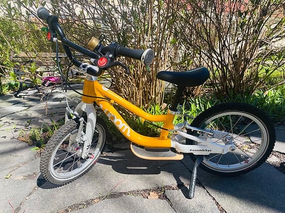 Woom 1 Plus barncykel 14" gul